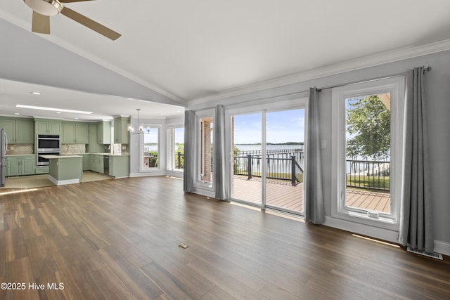 995 Chadwick Shores Dr, Sneads Ferry, NC 28460 - unfurnished living room with vaulted ceiling, a ceiling fan, healthy amount of natural light, ornamental molding, and a water view