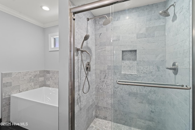 995 Chadwick Shores Dr, Sneads Ferry, NC 28460 - full bathroom featuring ornamental molding, a shower stall, and a bath