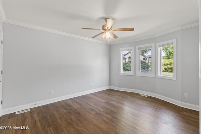 995 Chadwick Shores Dr, Sneads Ferry, NC 28460 - spare room with ceiling fan, dark wood finished floors, baseboards, and ornamental molding