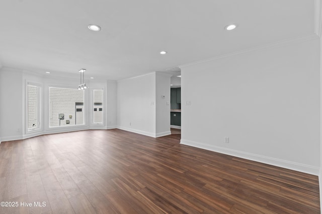 995 Chadwick Shores Dr, Sneads Ferry, NC 28460 - unfurnished living room featuring recessed lighting, baseboards, dark wood-type flooring, and crown molding