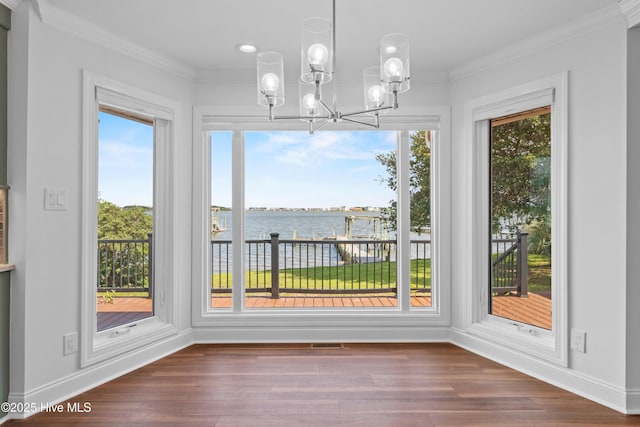 995 Chadwick Shores Dr, Sneads Ferry, NC 28460 - unfurnished sunroom with a water view and a chandelier