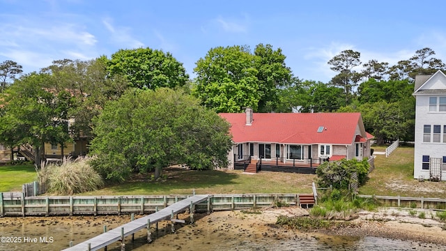 995 Chadwick Shores Dr, Sneads Ferry, NC 28460 - back of property featuring a water view and a lawn