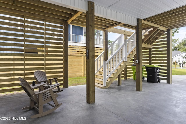 view of patio featuring stairway