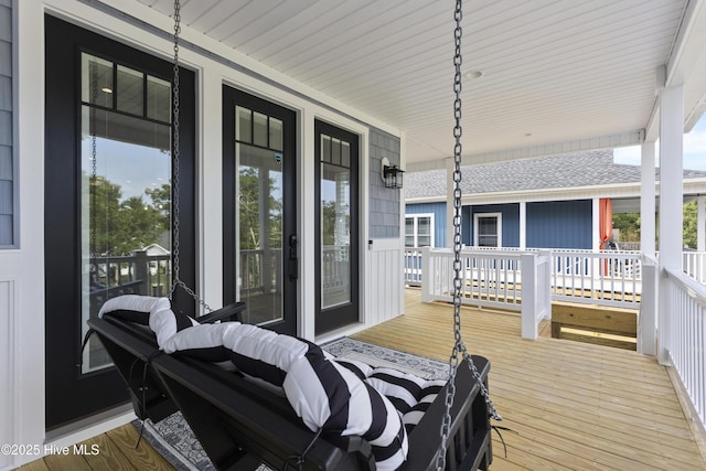 wooden deck featuring a porch