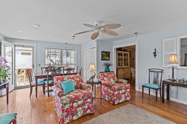 1613 E Pelican Dr, Oak Island, NC 28465 - living room featuring baseboards, recessed lighting, a ceiling fan, and light wood-style flooring
