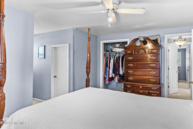 1613 E Pelican Dr, Oak Island, NC 28465 - bedroom with a ceiling fan, a closet, and multiple windows