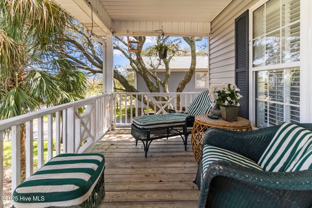 1613 E Pelican Dr, Oak Island, NC 28465 - view of wooden deck