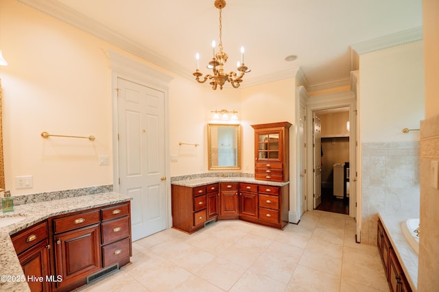 bathroom featuring vanity, tile patterned floors, a chandelier, a tub to relax in, and ornamental molding