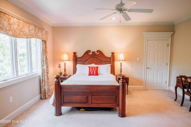 bedroom featuring baseboards, ornamental molding, and light colored carpet