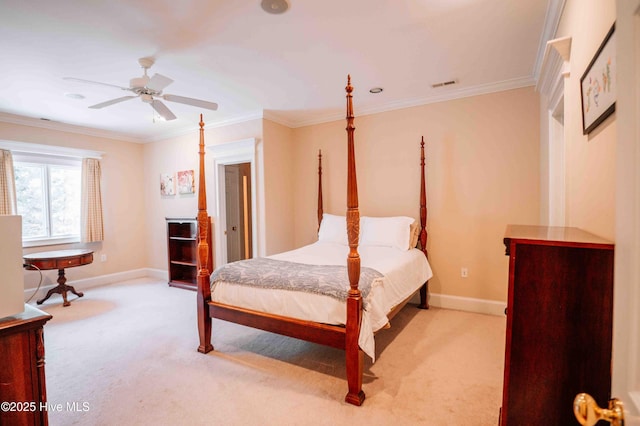 bedroom with ceiling fan, visible vents, light colored carpet, baseboards, and ornamental molding