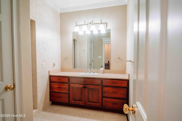 bathroom featuring crown molding, a walk in shower, tile patterned flooring, and vanity