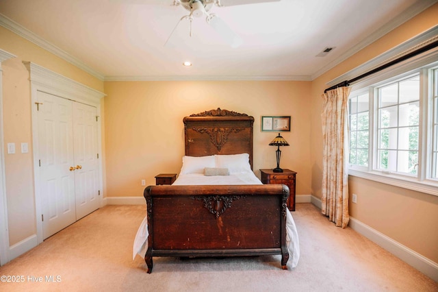 bedroom with visible vents, ornamental molding, baseboards, and light colored carpet