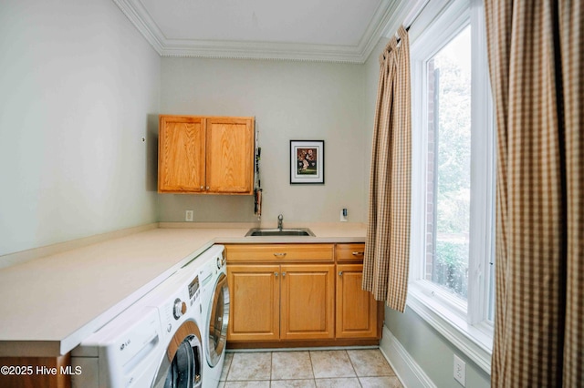 16 Mulbren Ct, Pinehurst, NC 28374 - laundry area featuring independent washer and dryer, cabinet space, crown molding, and light tile patterned floors