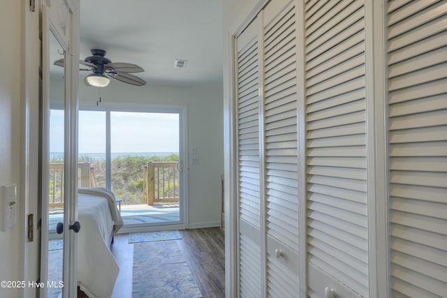 1774 New River Inlet Rd Unit 5, North Topsail Beach, NC 28460 - hallway featuring baseboards, visible vents, and wood finished floors