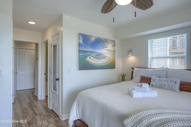 1774 New River Inlet Rd Unit 5, North Topsail Beach, NC 28460 - bedroom featuring ceiling fan and wood finished floors