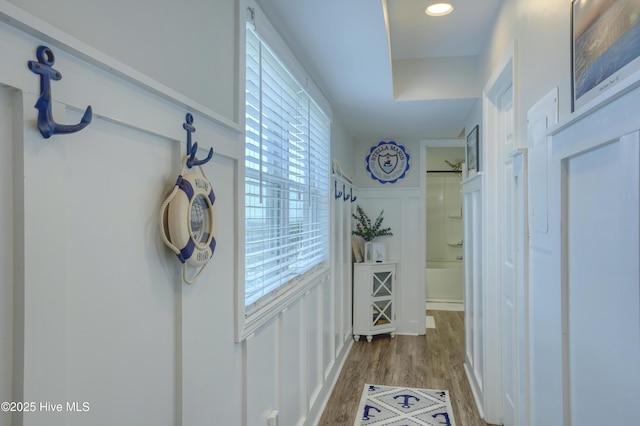 1774 New River Inlet Rd Unit 5, North Topsail Beach, NC 28460 - hallway featuring recessed lighting, dark wood-style flooring, and a decorative wall
