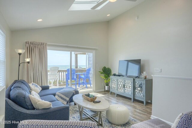1774 New River Inlet Rd Unit 5, North Topsail Beach, NC 28460 - living room with a ceiling fan, baseboards, plenty of natural light, and wood finished floors