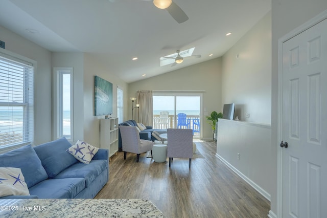 1774 New River Inlet Rd Unit 5, North Topsail Beach, NC 28460 - living room featuring recessed lighting, a ceiling fan, wood finished floors, and vaulted ceiling with skylight