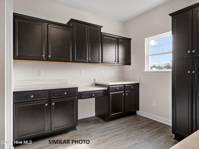 139 Tides End Dr, Holly Ridge, NC 28445 - kitchen with baseboards, light wood-style flooring, and light countertops