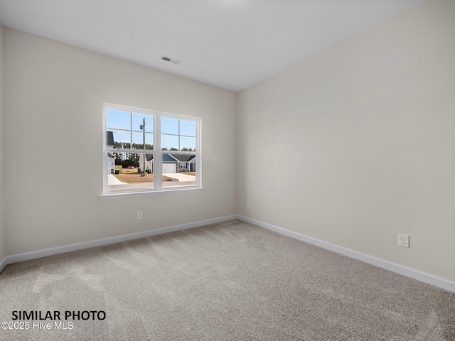 139 Tides End Dr, Holly Ridge, NC 28445 - carpeted spare room with baseboards and visible vents