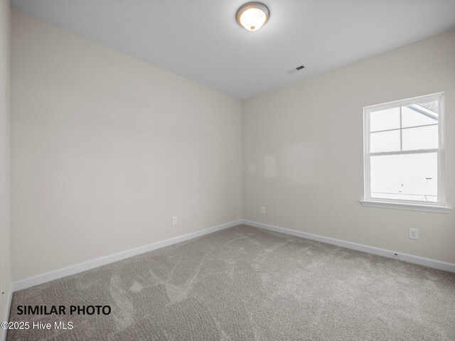 139 Tides End Dr, Holly Ridge, NC 28445 - carpeted empty room featuring visible vents and baseboards