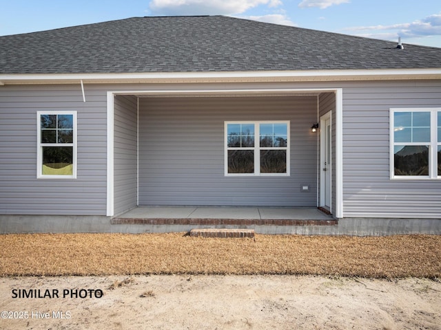 139 Tides End Dr, Holly Ridge, NC 28445 - rear view of property with a shingled roof