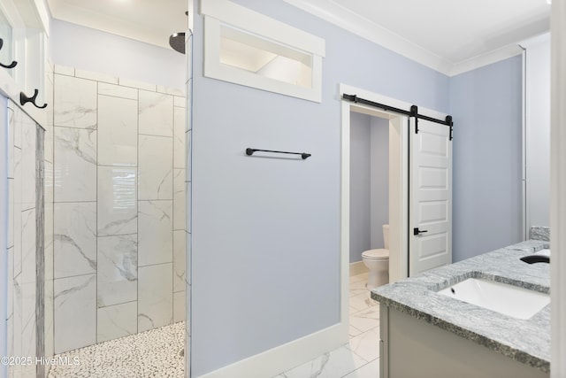 full bathroom featuring crown molding, a tile shower, toilet, marble finish floor, and baseboards