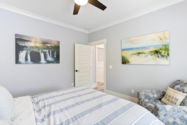bedroom featuring crown molding, baseboards, and ceiling fan