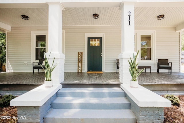 entrance to property with a porch
