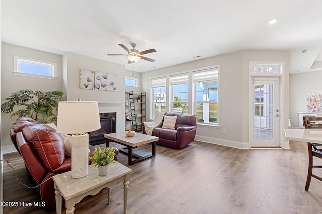 2226 Jasper Forest Trl, Winnabow, NC 28479 - living room with healthy amount of natural light, baseboards, wood finished floors, ceiling fan, and recessed lighting