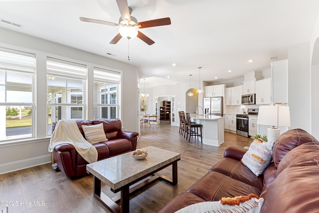 2226 Jasper Forest Trl, Winnabow, NC 28479 - living room with ceiling fan, baseboards, light wood-style floors, and recessed lighting