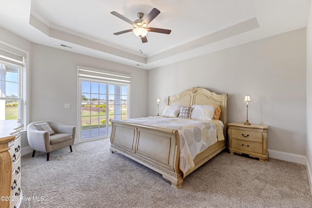 2226 Jasper Forest Trl, Winnabow, NC 28479 - bedroom with access to outside, a raised ceiling, carpet flooring, and crown molding