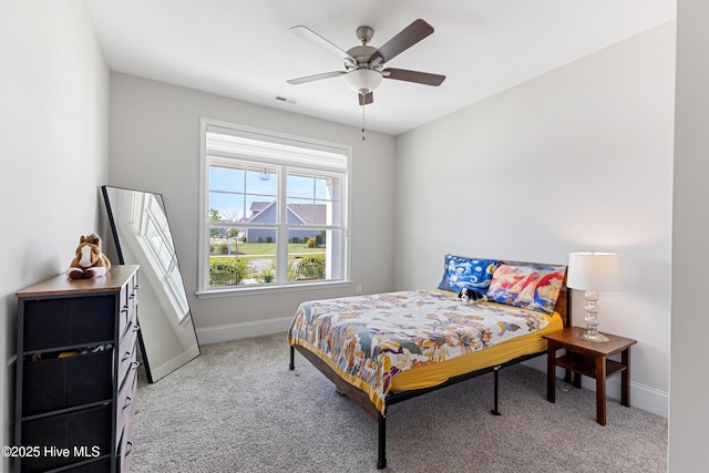 2226 Jasper Forest Trl, Winnabow, NC 28479 - bedroom with light carpet, baseboards, and ceiling fan