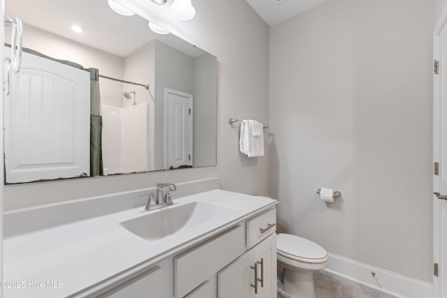 2226 Jasper Forest Trl, Winnabow, NC 28479 - full bathroom with vanity, toilet, a shower, tile patterned floors, and baseboards