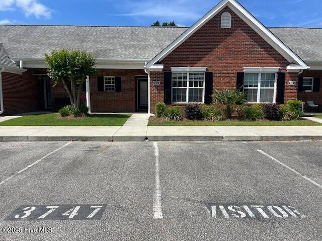 3747 Merestone Dr, Wilmington, NC 28412 - single story home with brick siding and uncovered parking