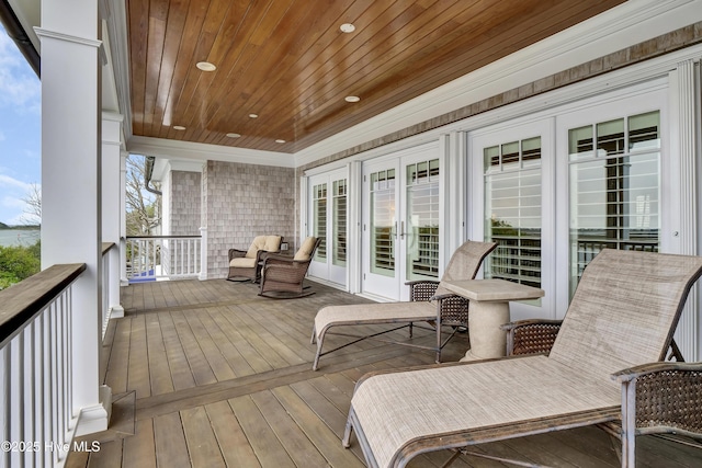 wooden deck with french doors
