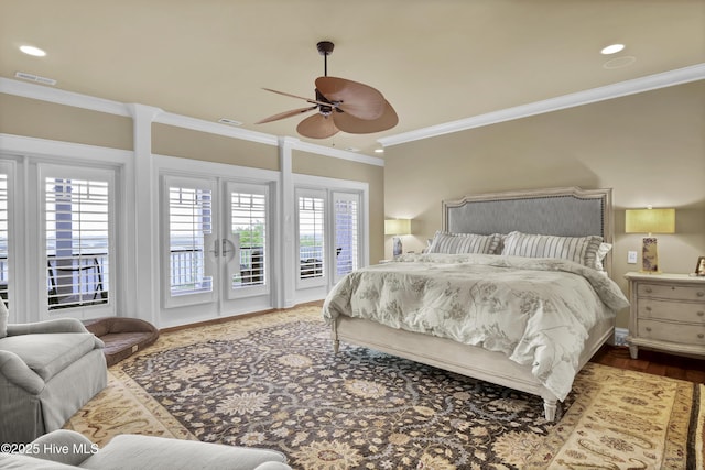 bedroom featuring recessed lighting, visible vents, ornamental molding, and access to exterior
