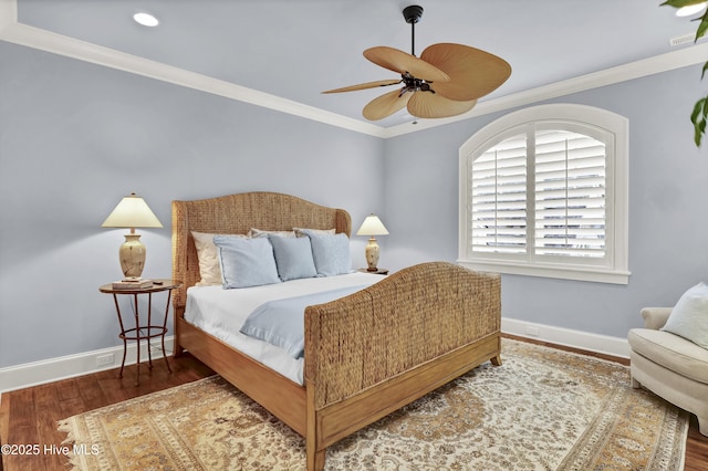 bedroom with crown molding, ceiling fan, recessed lighting, baseboards, and wood finished floors