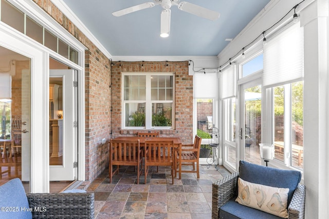 sunroom / solarium with ceiling fan