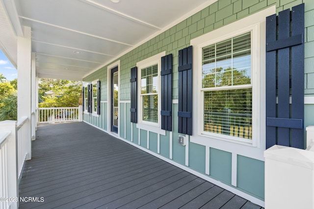 wooden deck featuring a porch