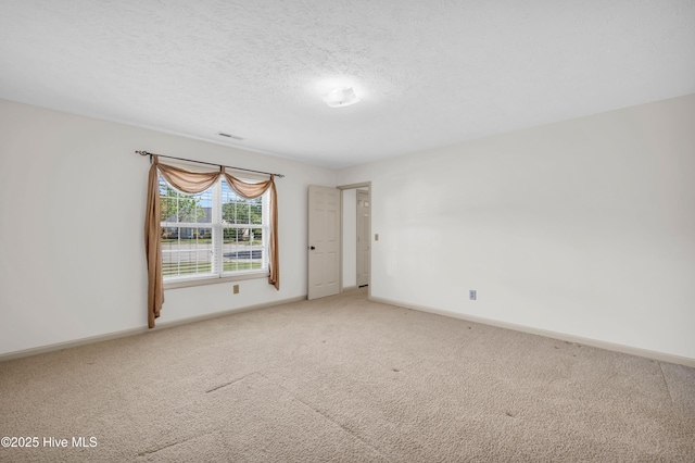 801 Plainfield Ct, Wilmington, NC 28411 - spare room with carpet floors, a textured ceiling, baseboards, and visible vents