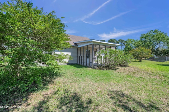 view of yard featuring fence