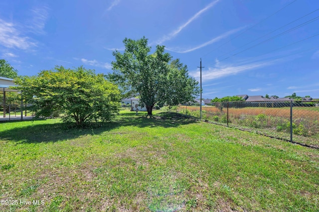 view of yard with fence