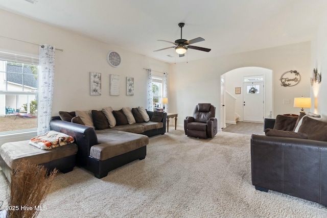 603 Coral Reef Ct, Sneads Ferry, NC 28460 - living area with baseboards, carpet flooring, arched walkways, and ceiling fan