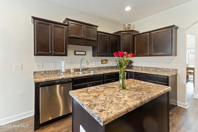 603 Coral Reef Ct, Sneads Ferry, NC 28460 - kitchen featuring dark wood finished floors, baseboards, stainless steel dishwasher, and a sink