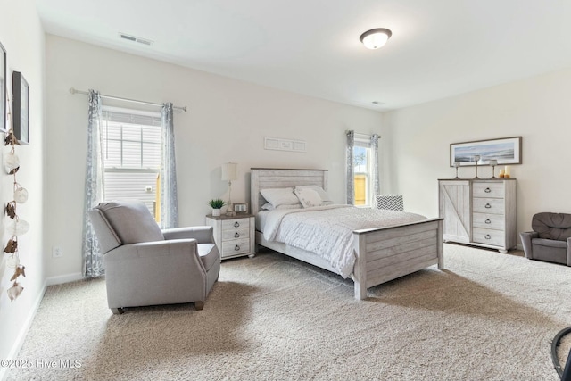 603 Coral Reef Ct, Sneads Ferry, NC 28460 - bedroom with baseboards, visible vents, and carpet floors