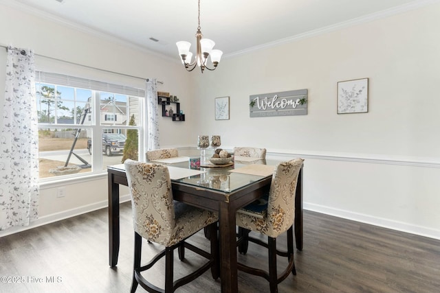 603 Coral Reef Ct, Sneads Ferry, NC 28460 - dining area with dark wood-style floors, visible vents, crown molding, baseboards, and a chandelier
