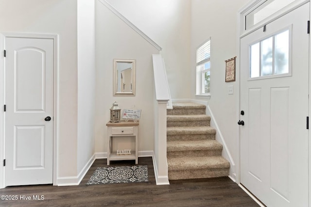 603 Coral Reef Ct, Sneads Ferry, NC 28460 - entrance foyer with baseboards, stairs, and dark wood finished floors