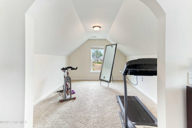 603 Coral Reef Ct, Sneads Ferry, NC 28460 - workout area featuring vaulted ceiling, baseboards, and carpet floors