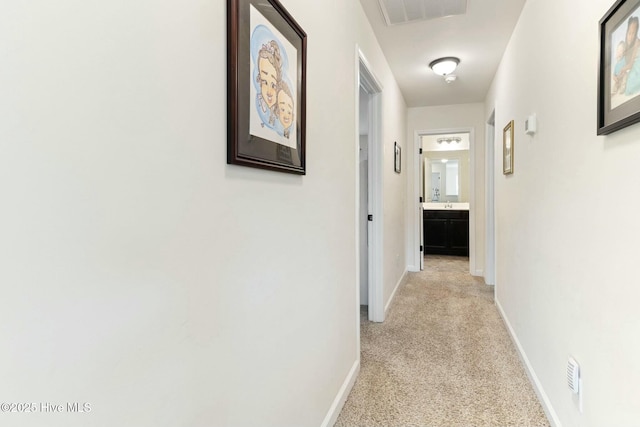 603 Coral Reef Ct, Sneads Ferry, NC 28460 - hall featuring baseboards, visible vents, and light carpet